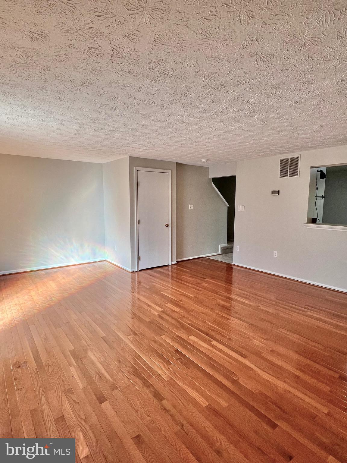 9624 Glendower Court Laurel, MD 20723 - Photo 12 of 26 wooden floor in an empty room