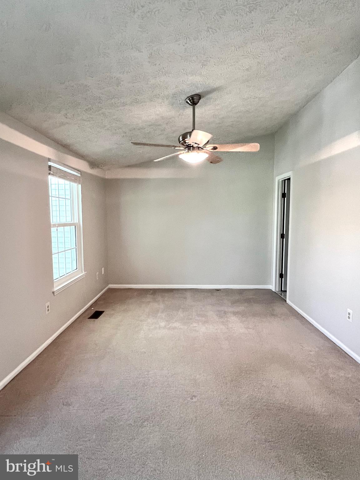 9624 Glendower Court Laurel, MD 20723 - Photo 17 of 26 a view of an empty room with a window