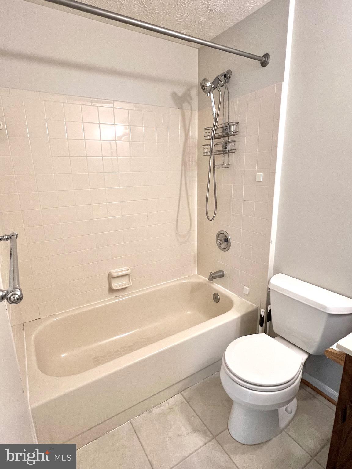 9624 Glendower Court Laurel, MD 20723 - Photo 22 of 26 a bathroom with a toilet bathtub and shower