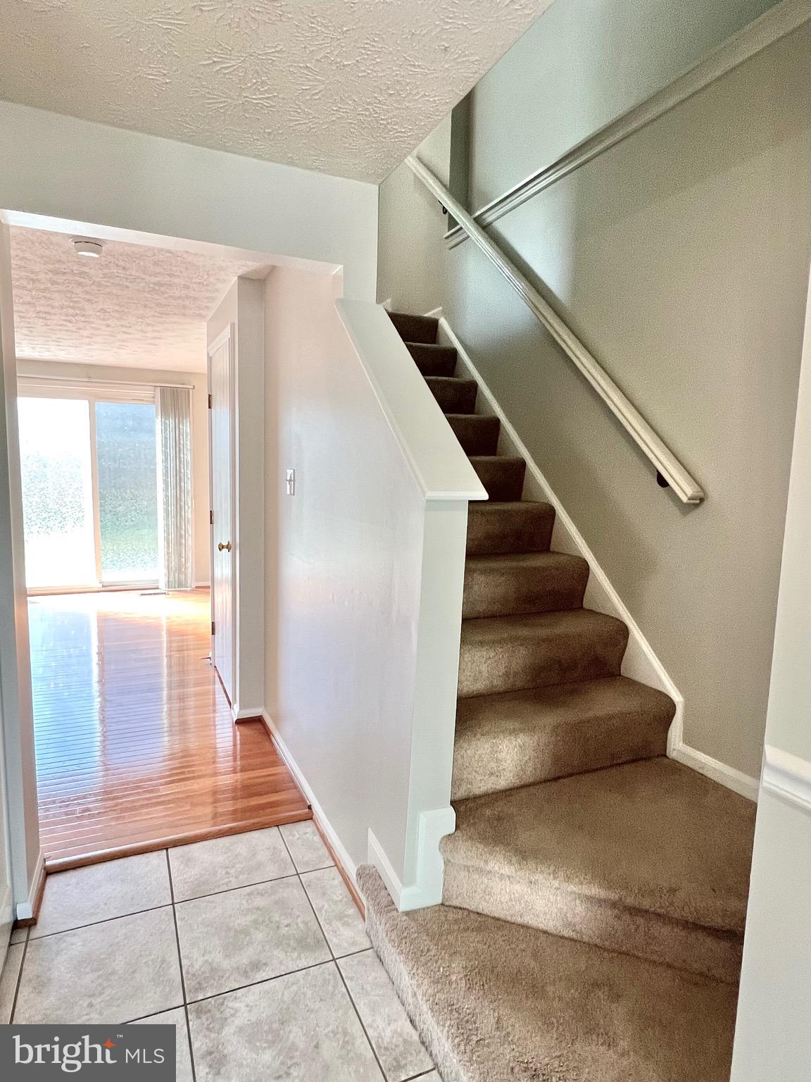9624 Glendower Court Laurel, MD 20723 - Photo 4 of 26 a view of entryway and hall with wooden floor