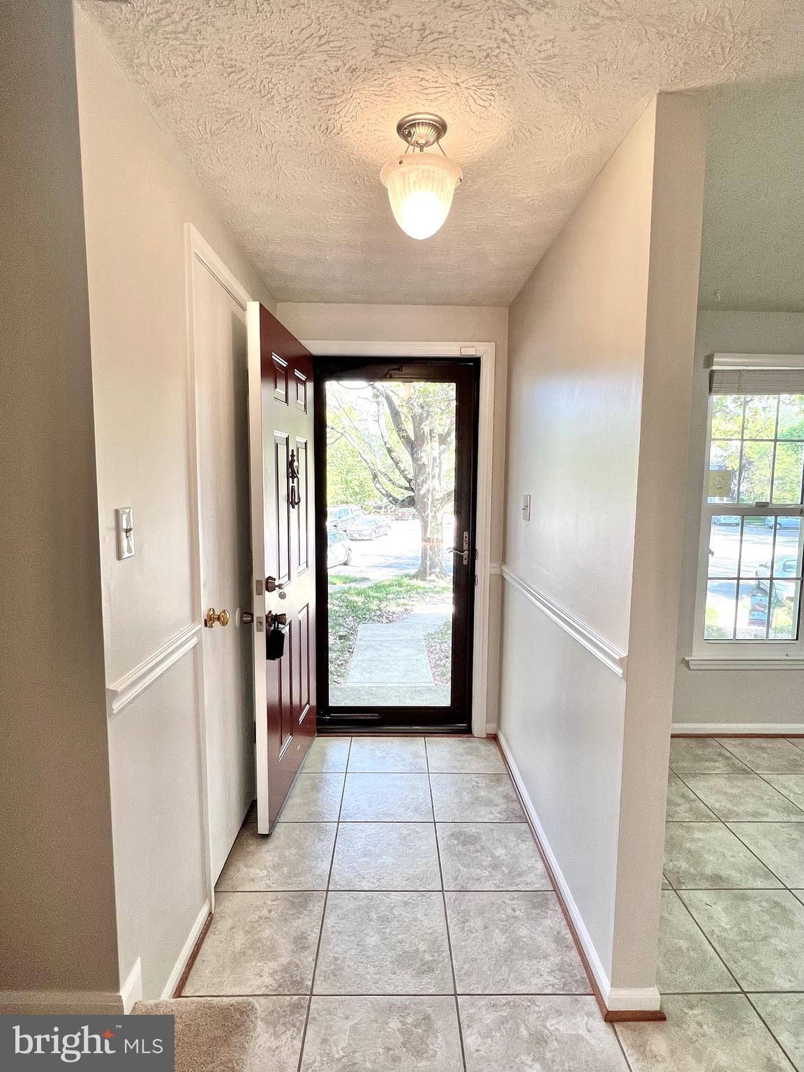 9624 Glendower Court Laurel, MD 20723 - Photo 5 of 26 a view of a hallway with windows