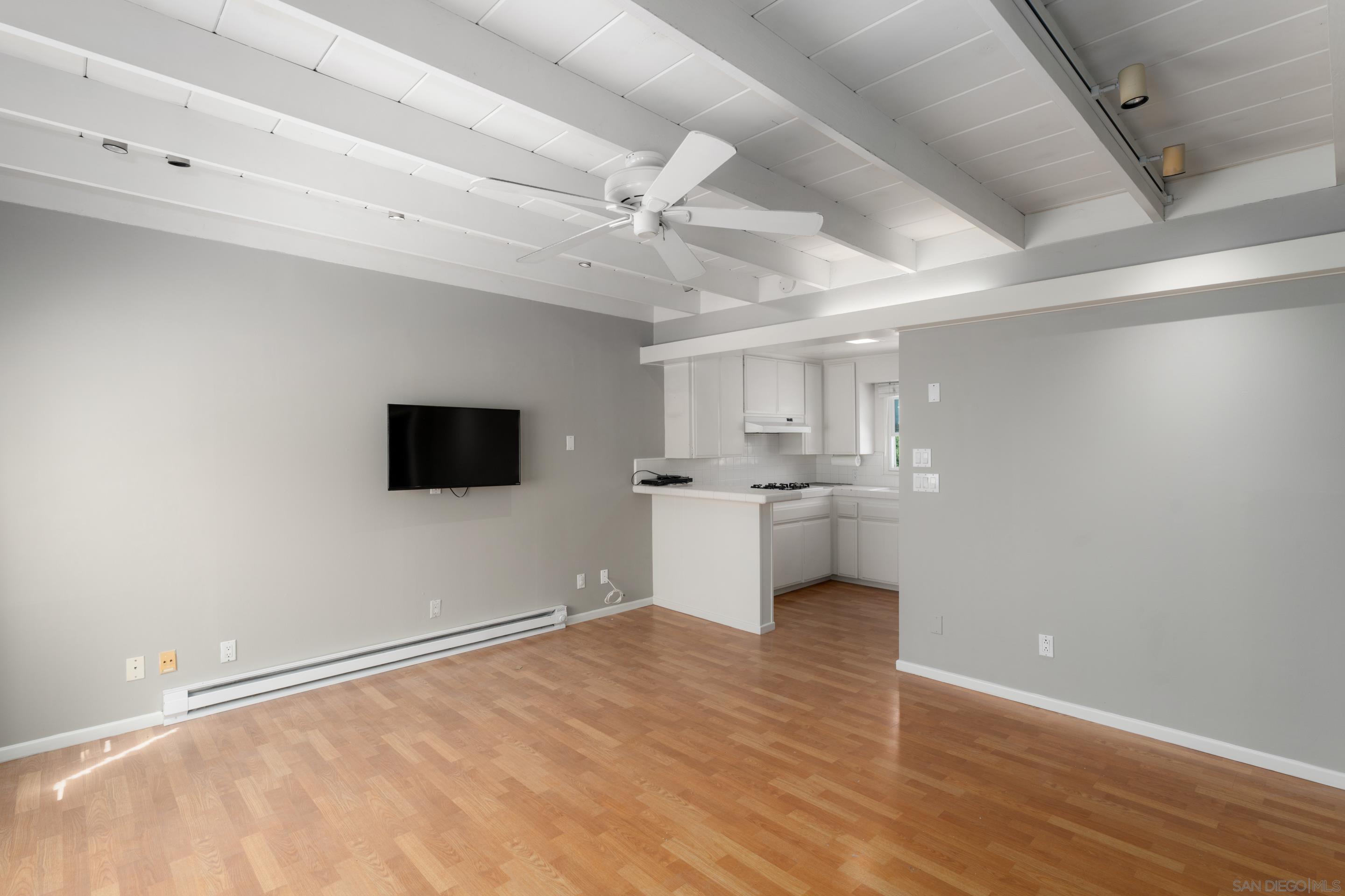 1834 Ocean Front Del Mar, CA 92014 - Photo 20 of 36 a view of a kitchen with a sink and a microwave