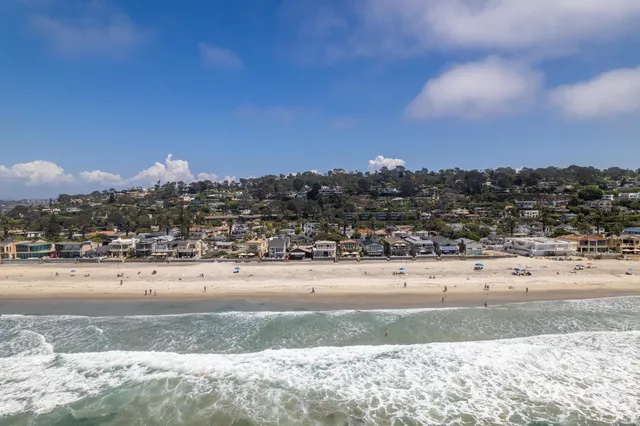 a view of a yard and mountain