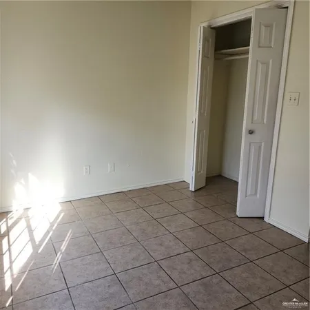 a view of a room that has a window in it
