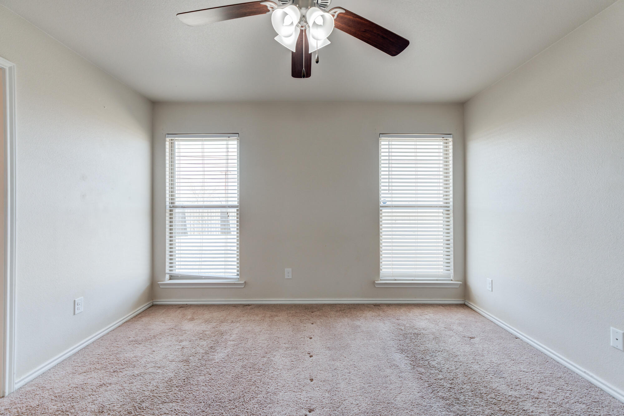 7012 34th Place Lubbock, TX 79407 - Photo 24 of 36 a view of an empty room with a window