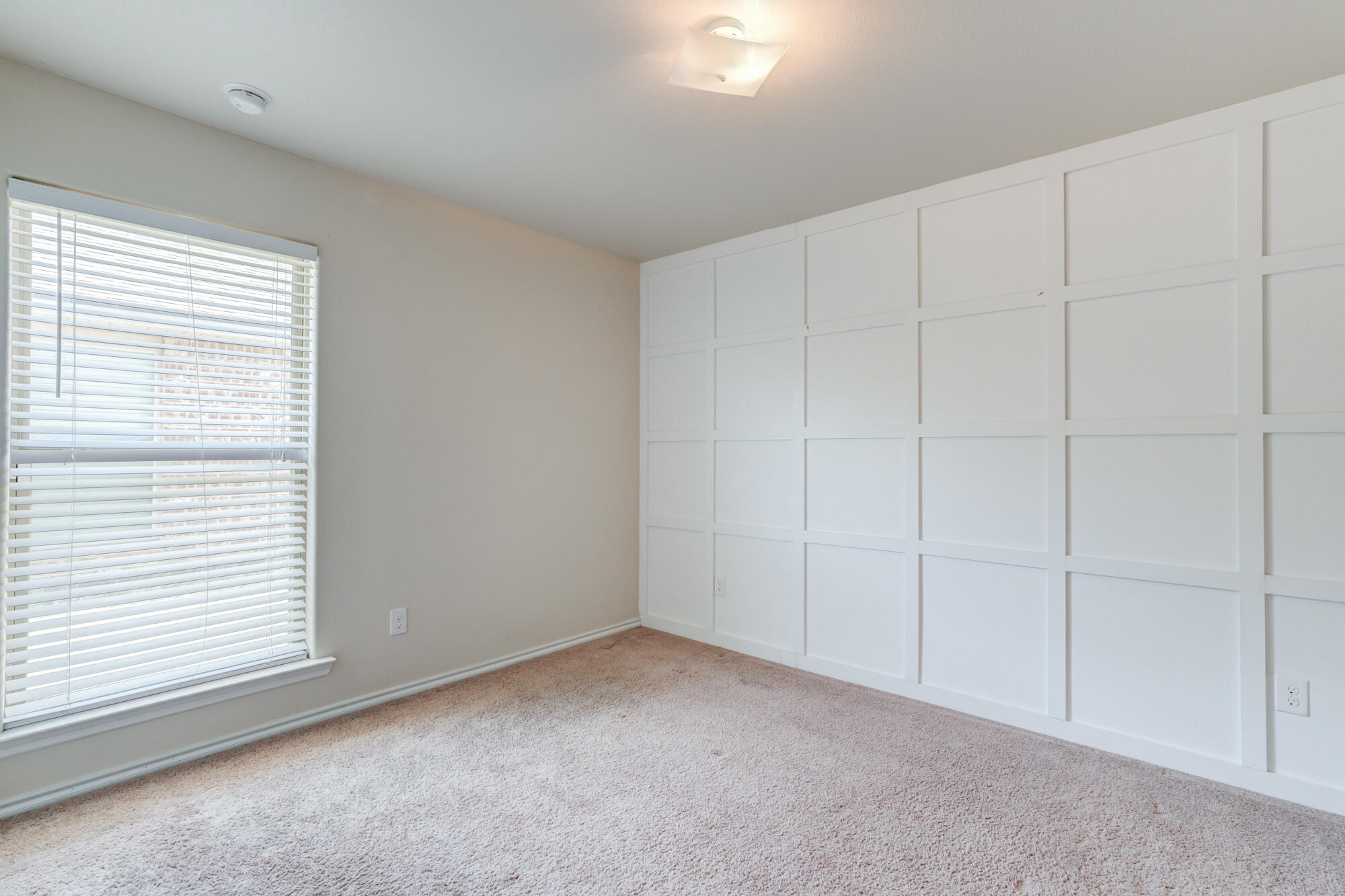7012 34th Place Lubbock, TX 79407 - Photo 28 of 36 a view of an empty room with a window