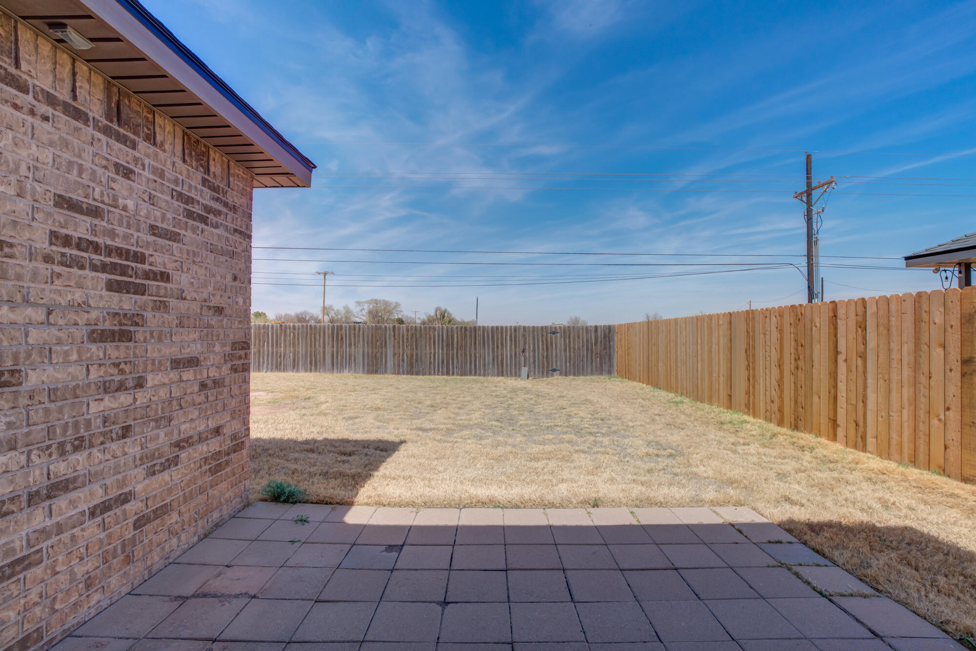 7012 34th Place Lubbock, TX 79407 - Photo 34 of 36 a view of a backyard