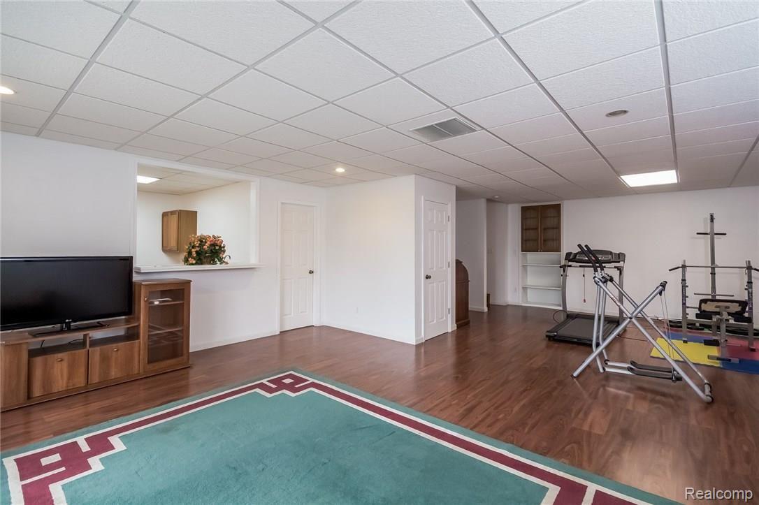 23835 Elwell Road Belleville, MI 48111 - Photo 38 of 78 LOWER LIVING ROOM/REC ROOM