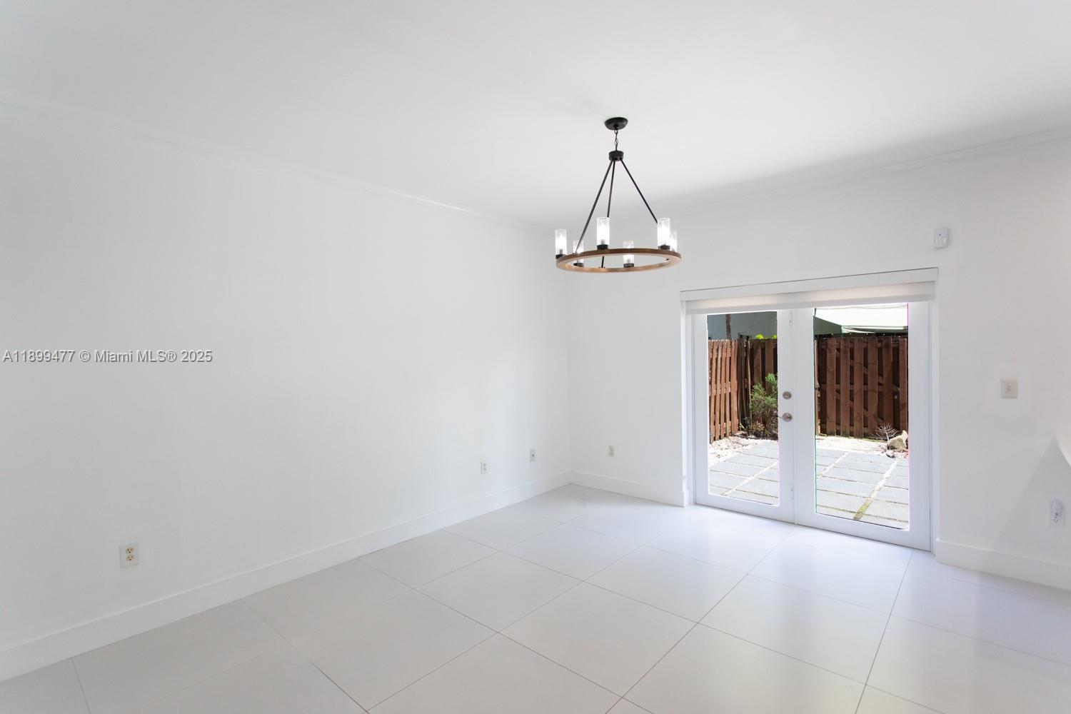 14219 Southwest 126th Place Miami, FL 33186 - Photo 12 of 26 a view of a room with windows