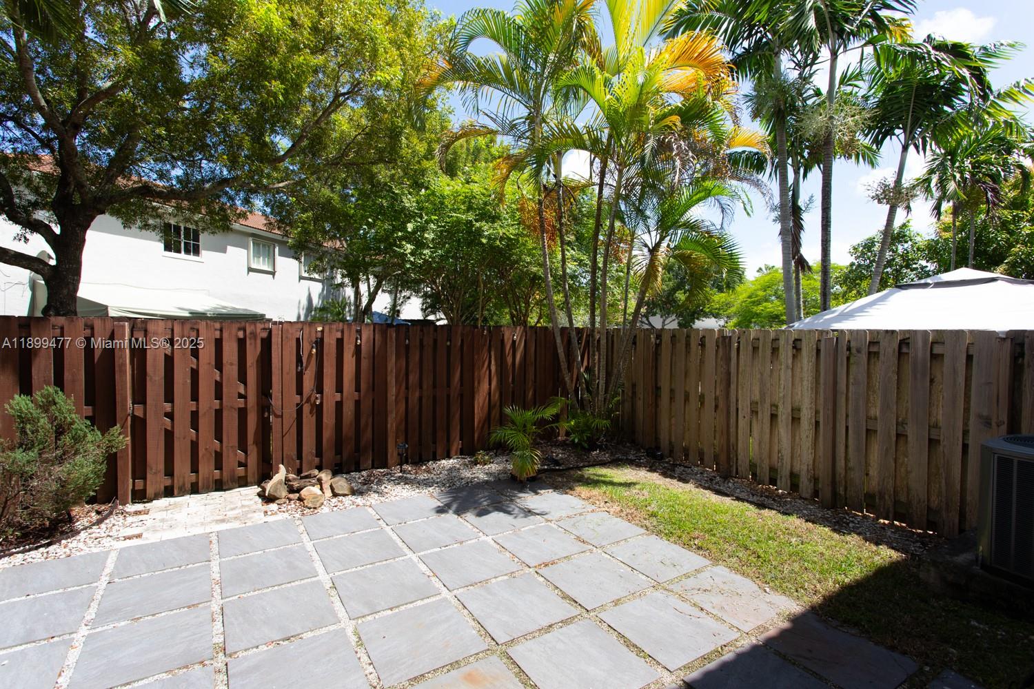 14219 Southwest 126th Place Miami, FL 33186 - Photo 13 of 26 a view of wooden fence