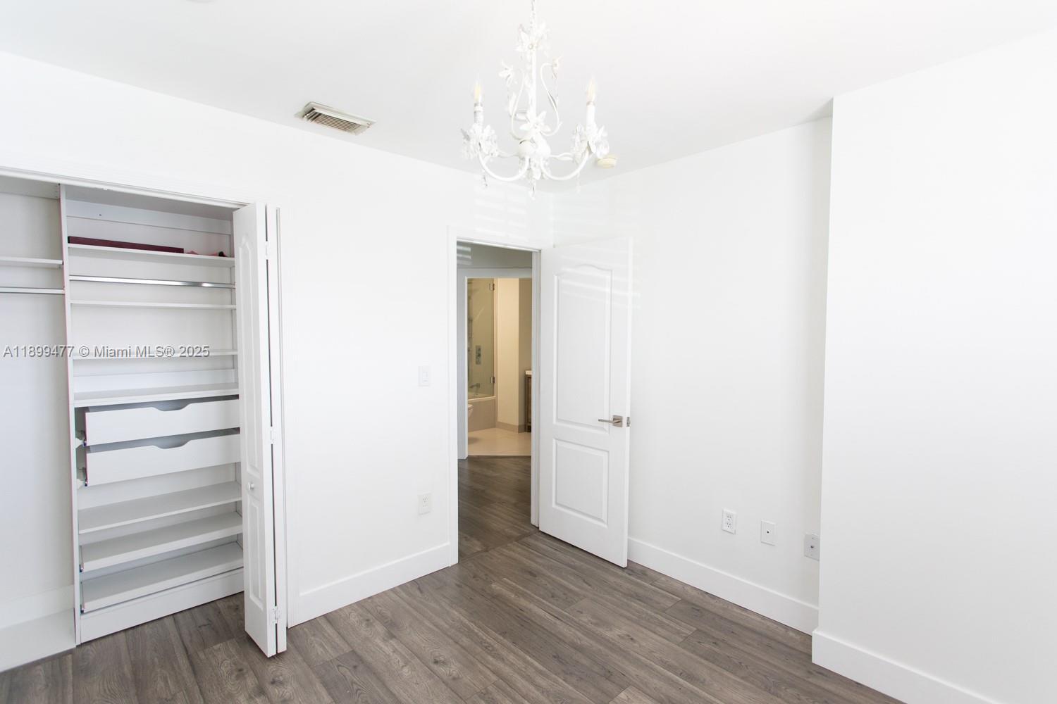 14219 Southwest 126th Place Miami, FL 33186 - Photo 15 of 26 a view of a hallway with entryway
