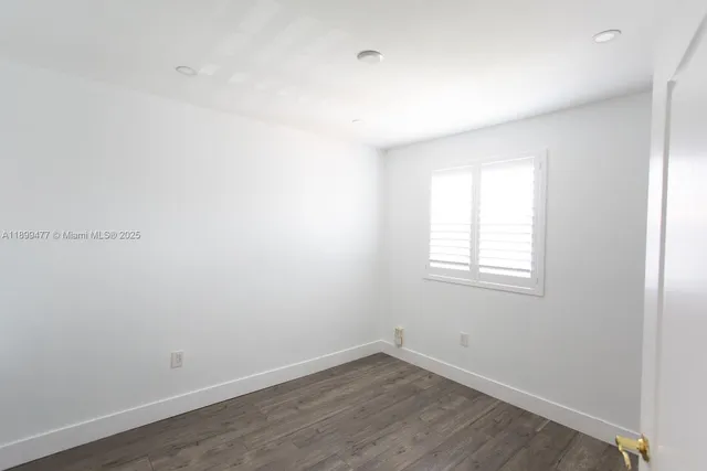 a bathroom with a bathtub and a sink