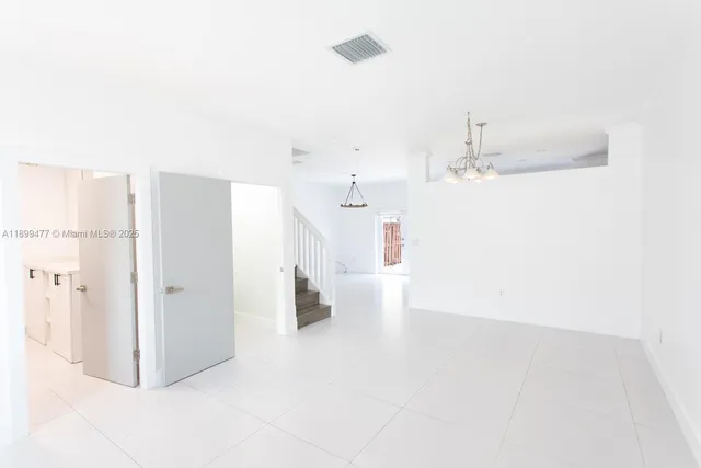 a view of a room with an empty space