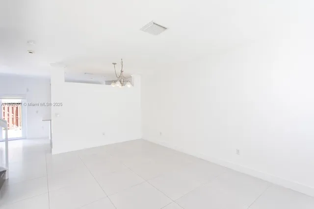 a bathroom with a sink a mirror and shower