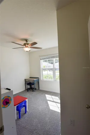 a living room with furniture or couch and a window