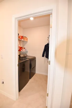 a bathroom with a granite countertop sink a shower and a mirror