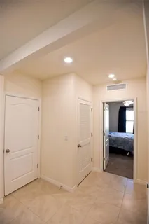 a bathroom with a granite countertop sink a shower and a mirror