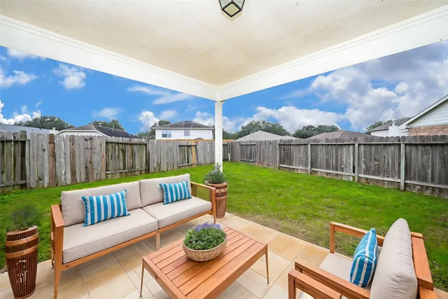 a view of an outdoor sitting area and fire pit
