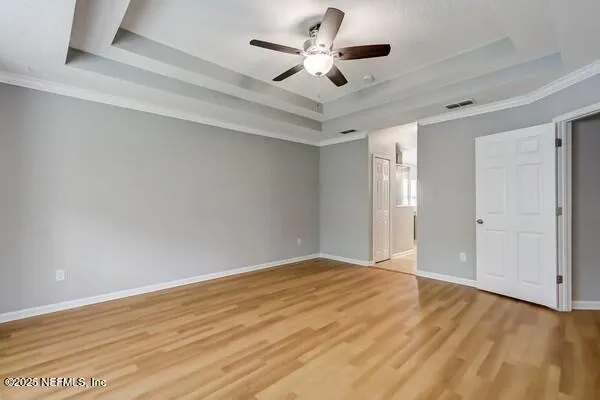 a bathroom with a mirror and a shower