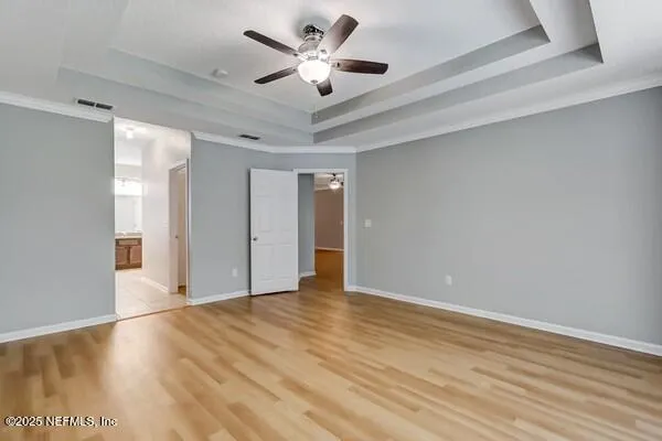 a view of an empty walk in closet