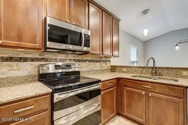 a view of door with cabinets