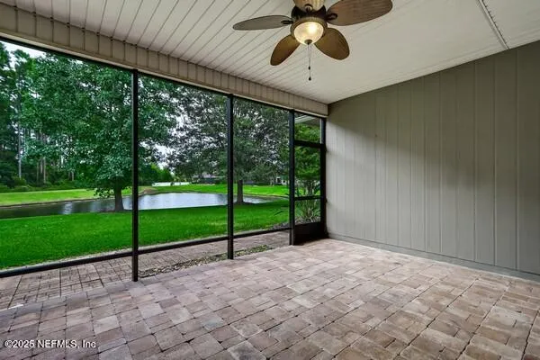 a front view of a house with a garden and porch