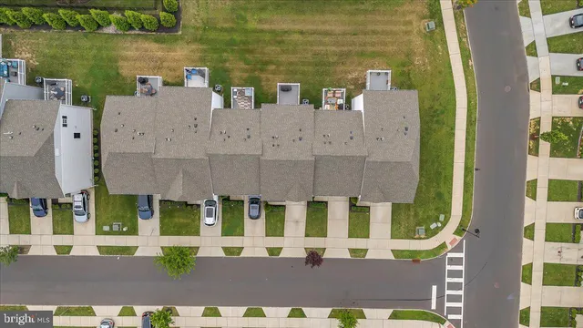 front view of a building with a yard