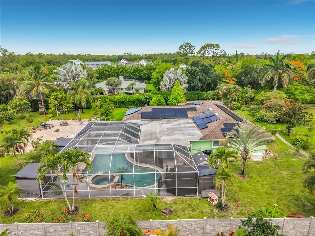 2280 Capri Court Naples, FL 34105 - Photo 24 of 49 an aerial view of a house with a garden