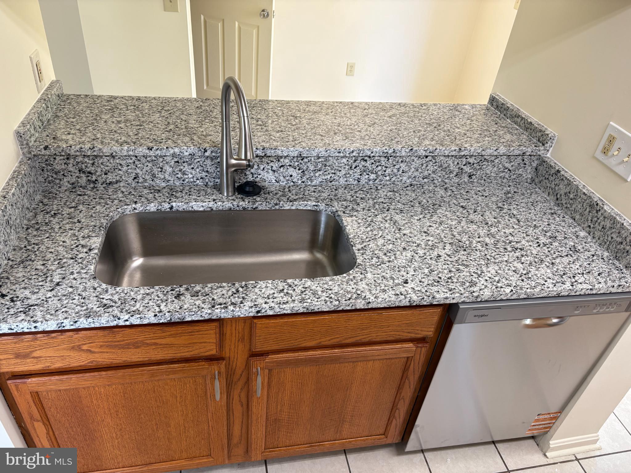 4342 Downs Square Belcamp, MD 21017 - Photo 7 of 30 a kitchen with a sink and a refrigerator