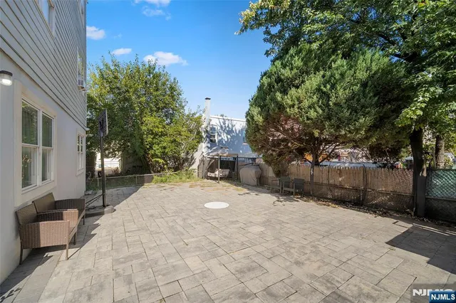 a view of a white building among the street