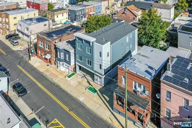 a view of a city with tall buildings