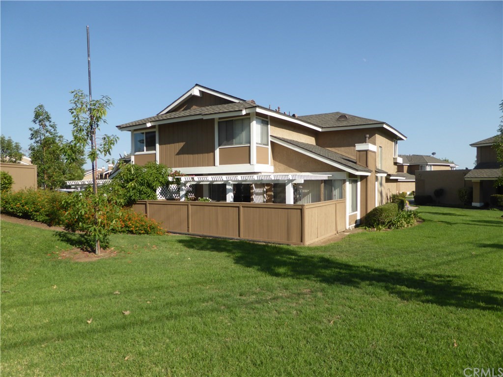 a house view with a garden space