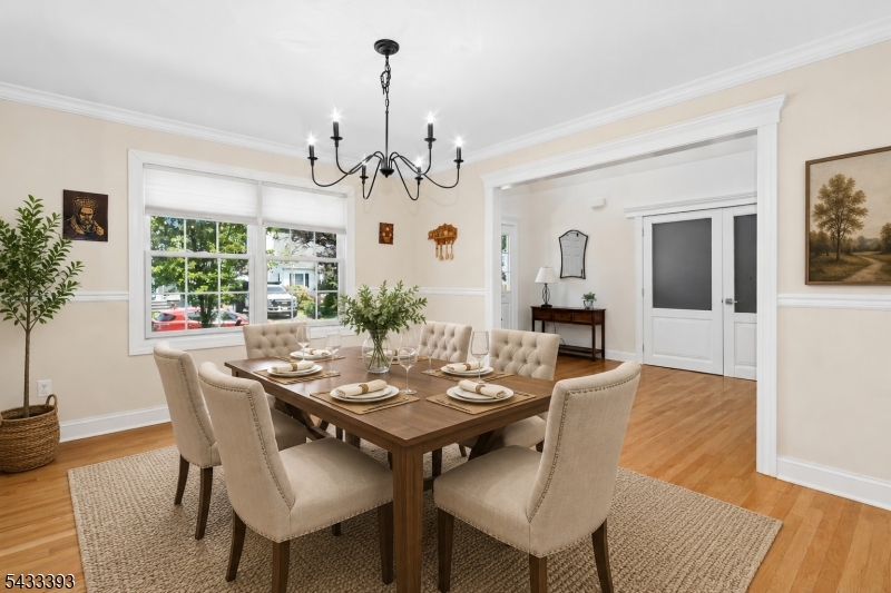 33 Stanton Street Clark, NJ 07066 - Photo 11 of 37 a view of a dining room with furniture window and wooden floor