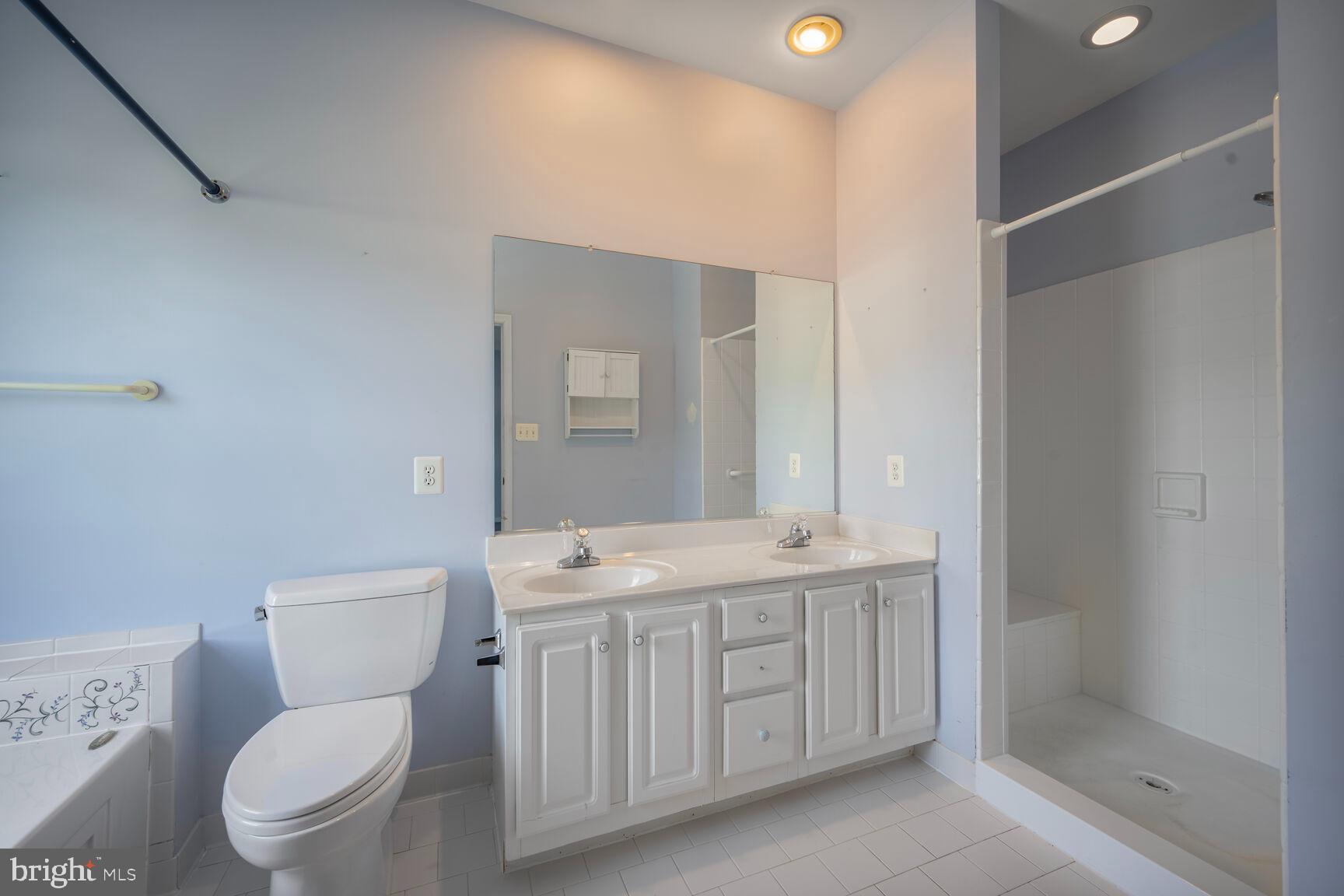 370 Hart Road Gaithersburg, MD 20878 - Photo 16 of 40 Double sinks in primary bath and walk-in shower