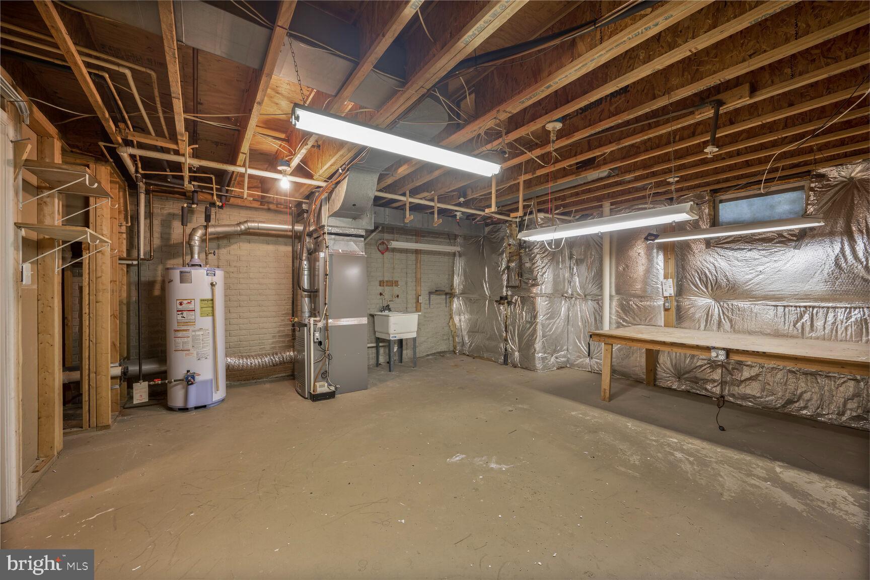 370 Hart Road Gaithersburg, MD 20878 - Photo 26 of 40 Utility/storage room in basement with work table