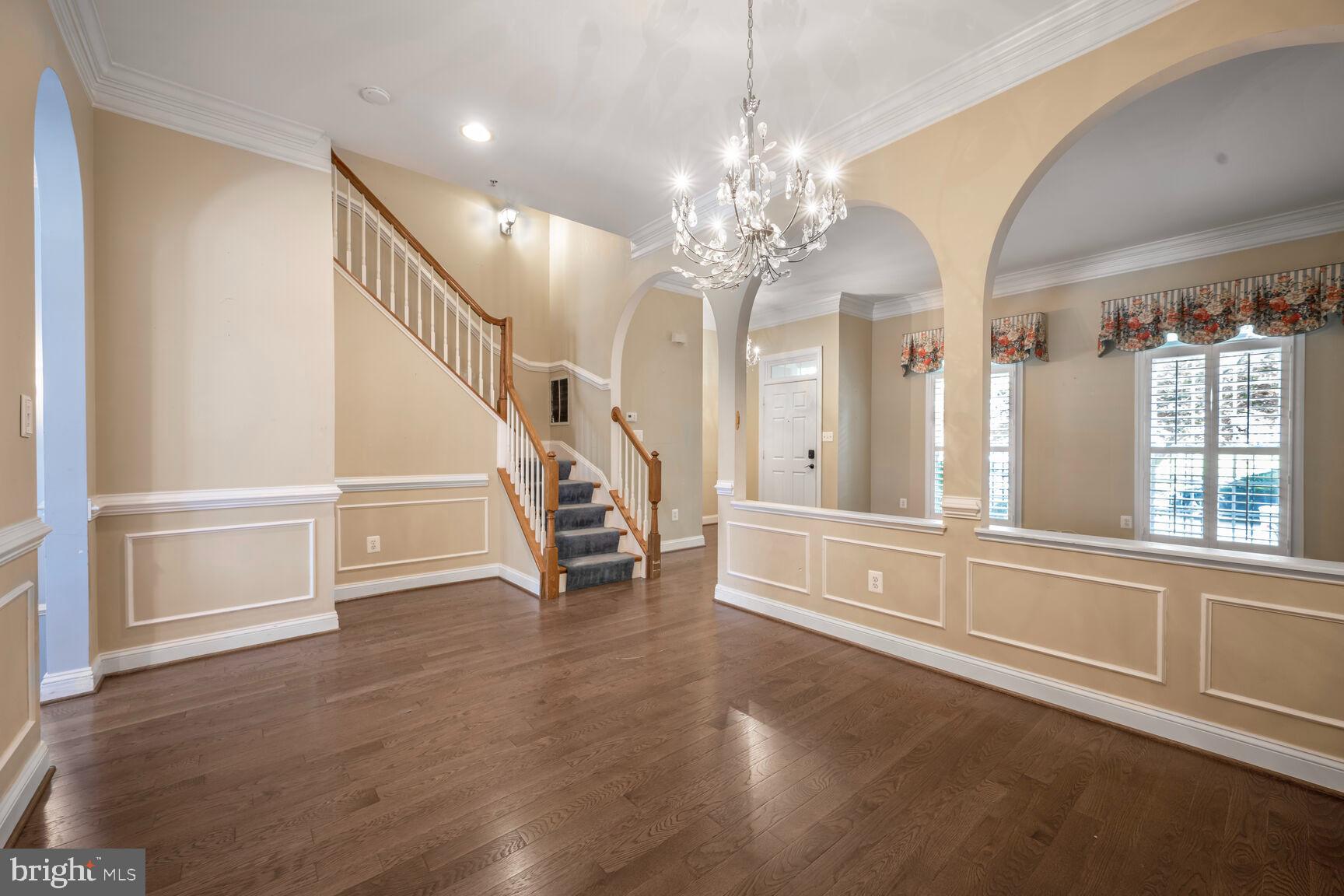 370 Hart Road Gaithersburg, MD 20878 - Photo 7 of 40 Formal dining room and main staircase
