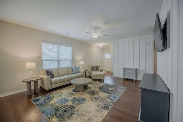 a living room with furniture and a couch
