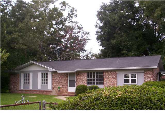 217 Forrest Parkway Crestview, FL 32539 - Photo 1 of 11 a front view of a house with a garden