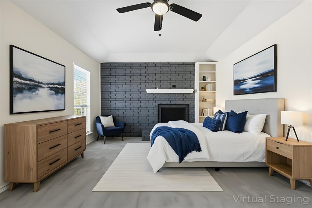 2145 Willow Place, Unit B Carrollton, TX 75006 - Photo 18 of 39 a living room with furniture and a fireplace