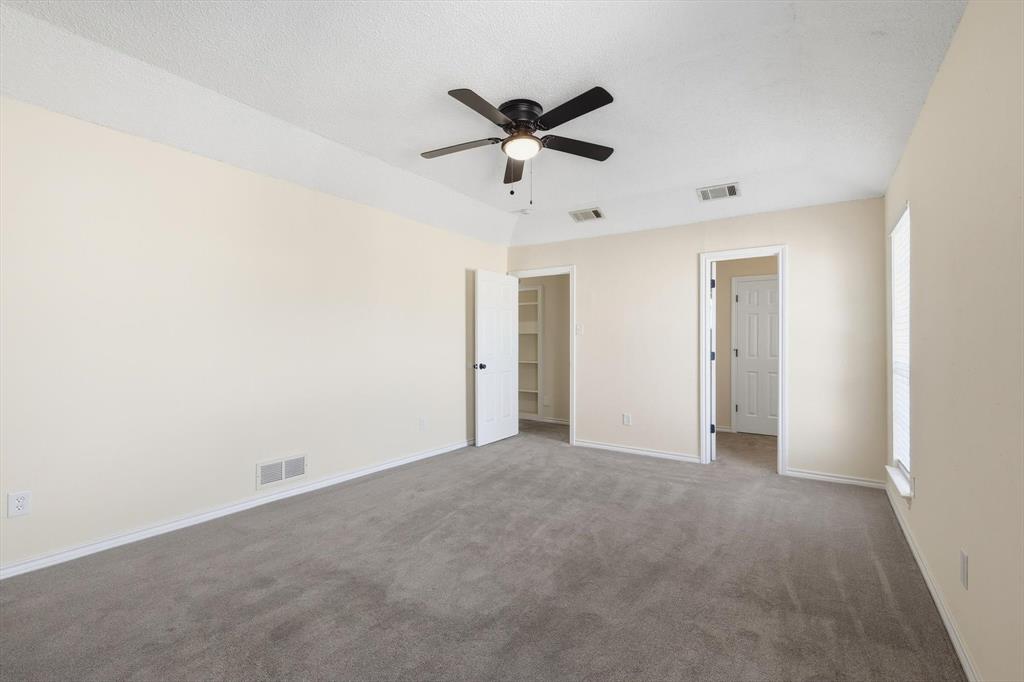 2145 Willow Place, Unit B Carrollton, TX 75006 - Photo 20 of 39 a view of an empty room