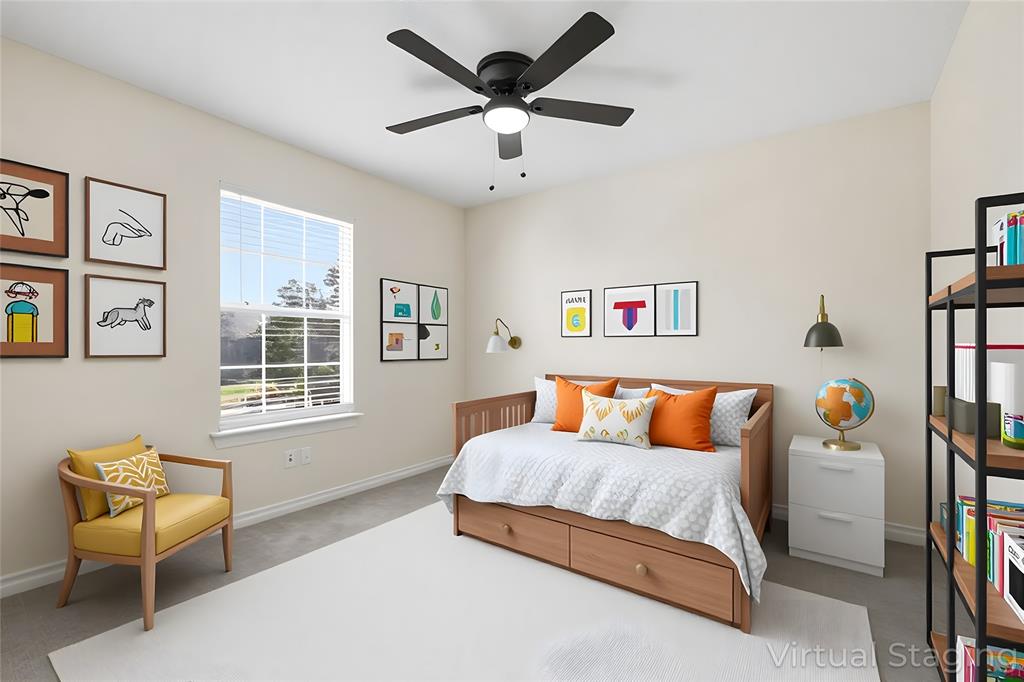 2145 Willow Place, Unit B Carrollton, TX 75006 - Photo 27 of 39 a bedroom with a bed and a couch