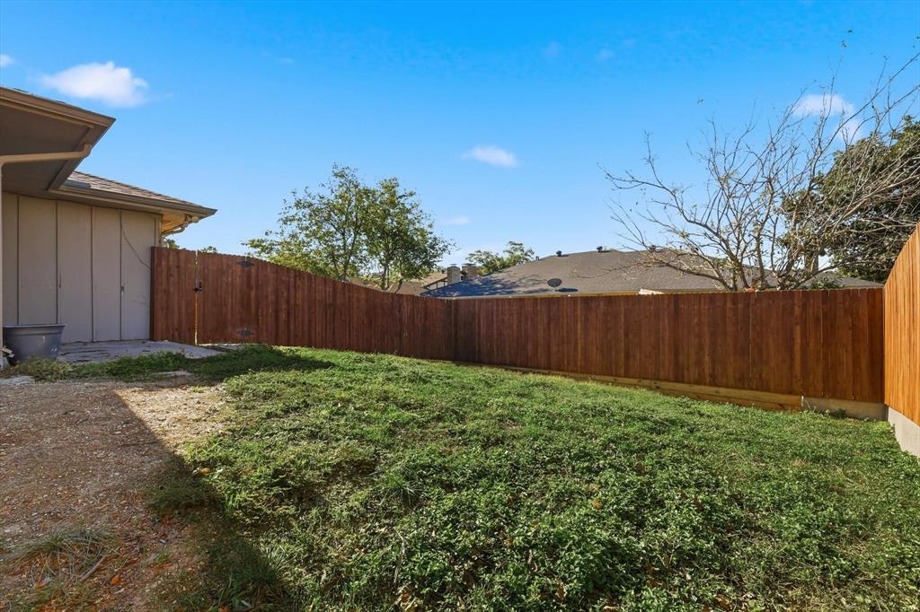 2145 Willow Place, Unit B Carrollton, TX 75006 - Photo 33 of 39 a view of a backyard