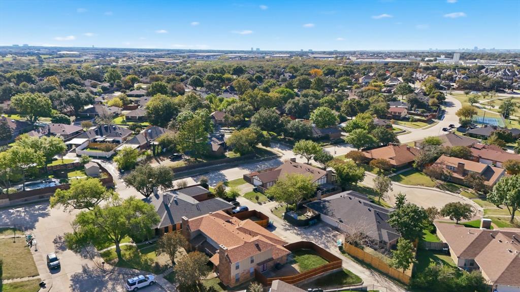 2145 Willow Place, Unit B Carrollton, TX 75006 - Photo 35 of 39 an aerial view of residential houses with outdoor space