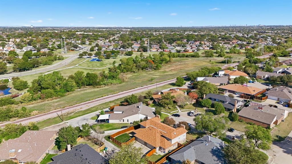 2145 Willow Place, Unit B Carrollton, TX 75006 - Photo 39 of 39 an aerial view of residential building and lake