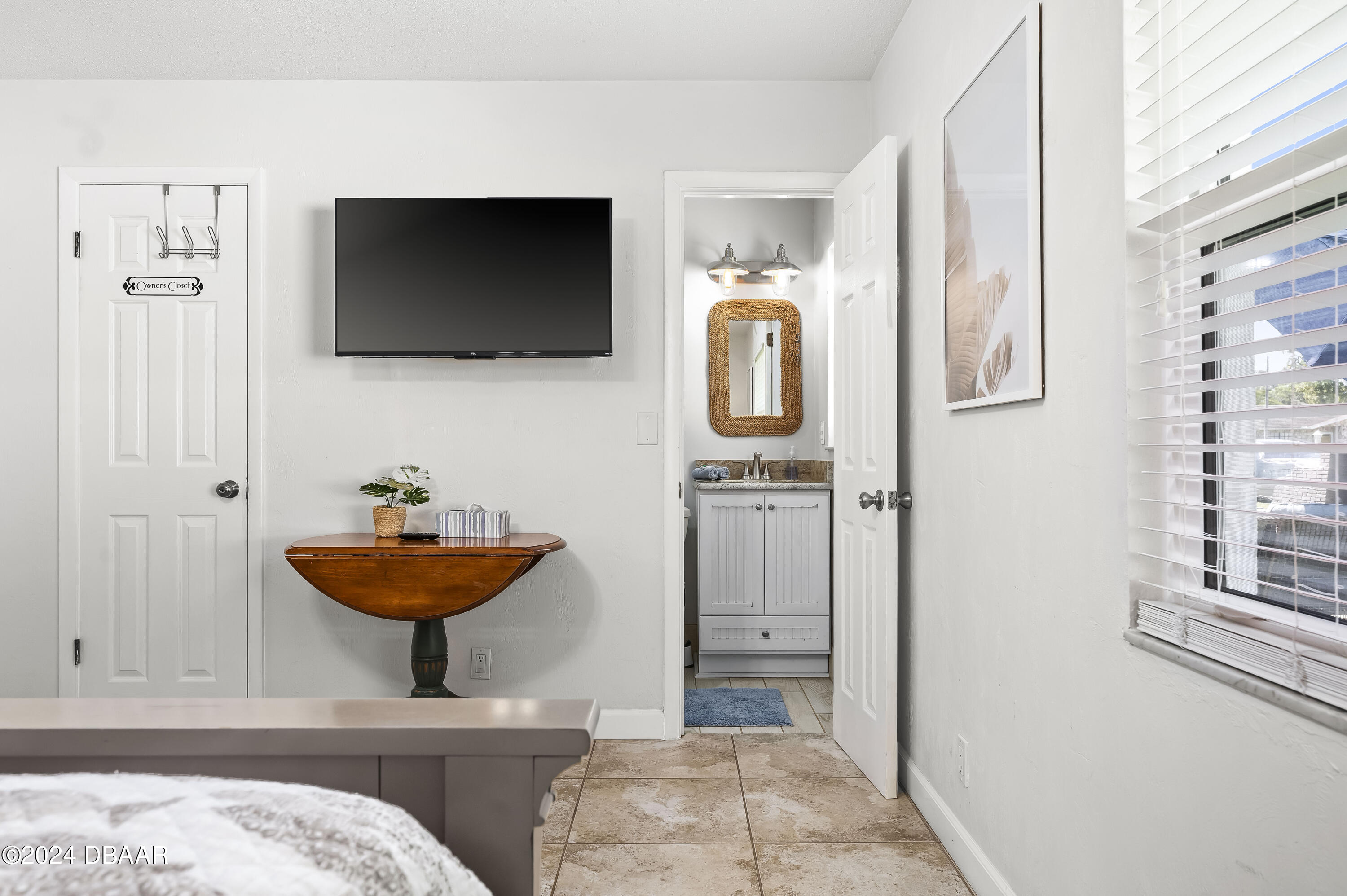 5528 Riverside Drive Port Orange, FL 32127 - Photo 19 of 31 a view of a living room and a flat screen tv