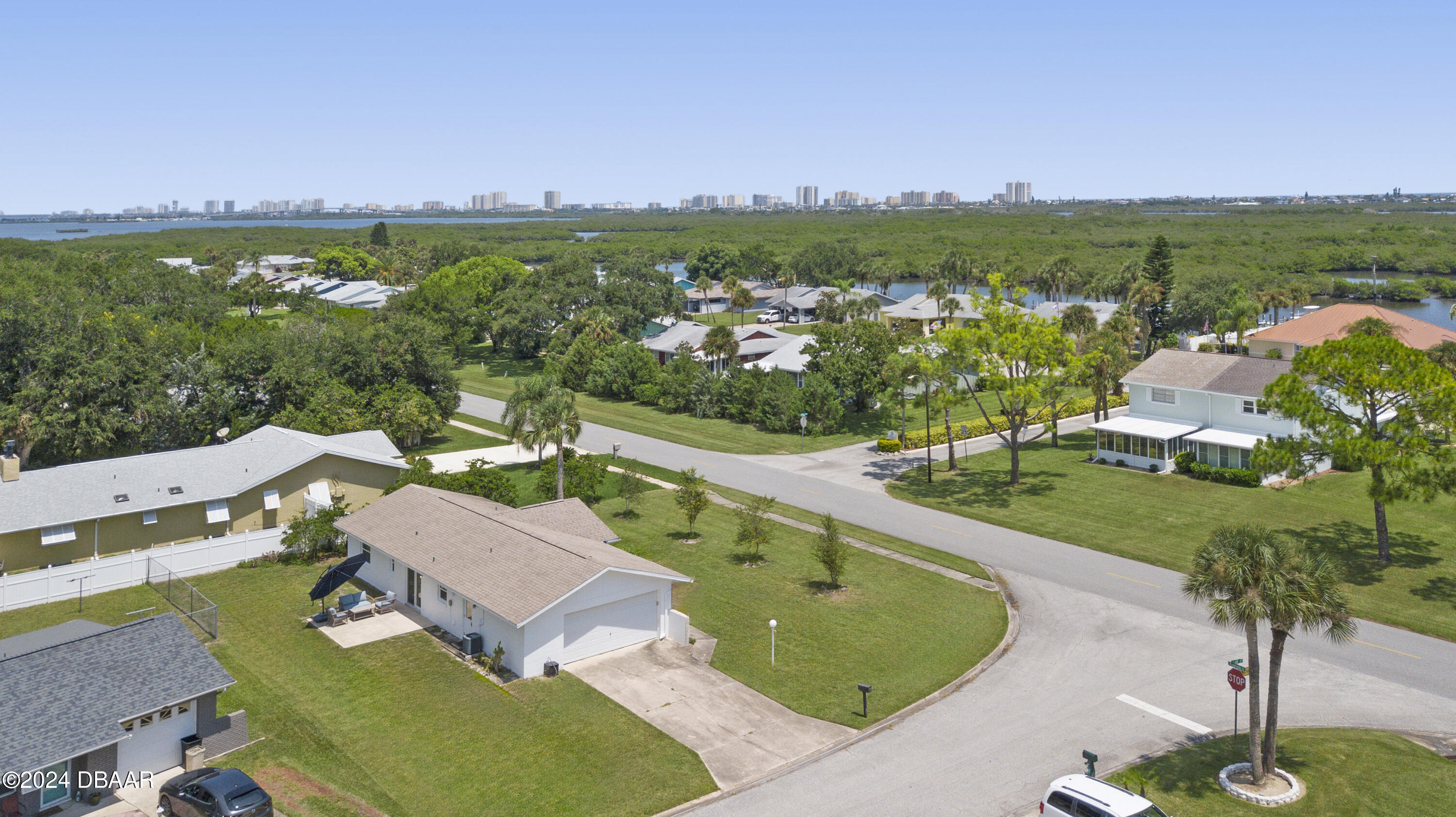 5528 Riverside Drive Port Orange, FL 32127 - Photo 26 of 31 an aerial view of a house with a garden and lake view