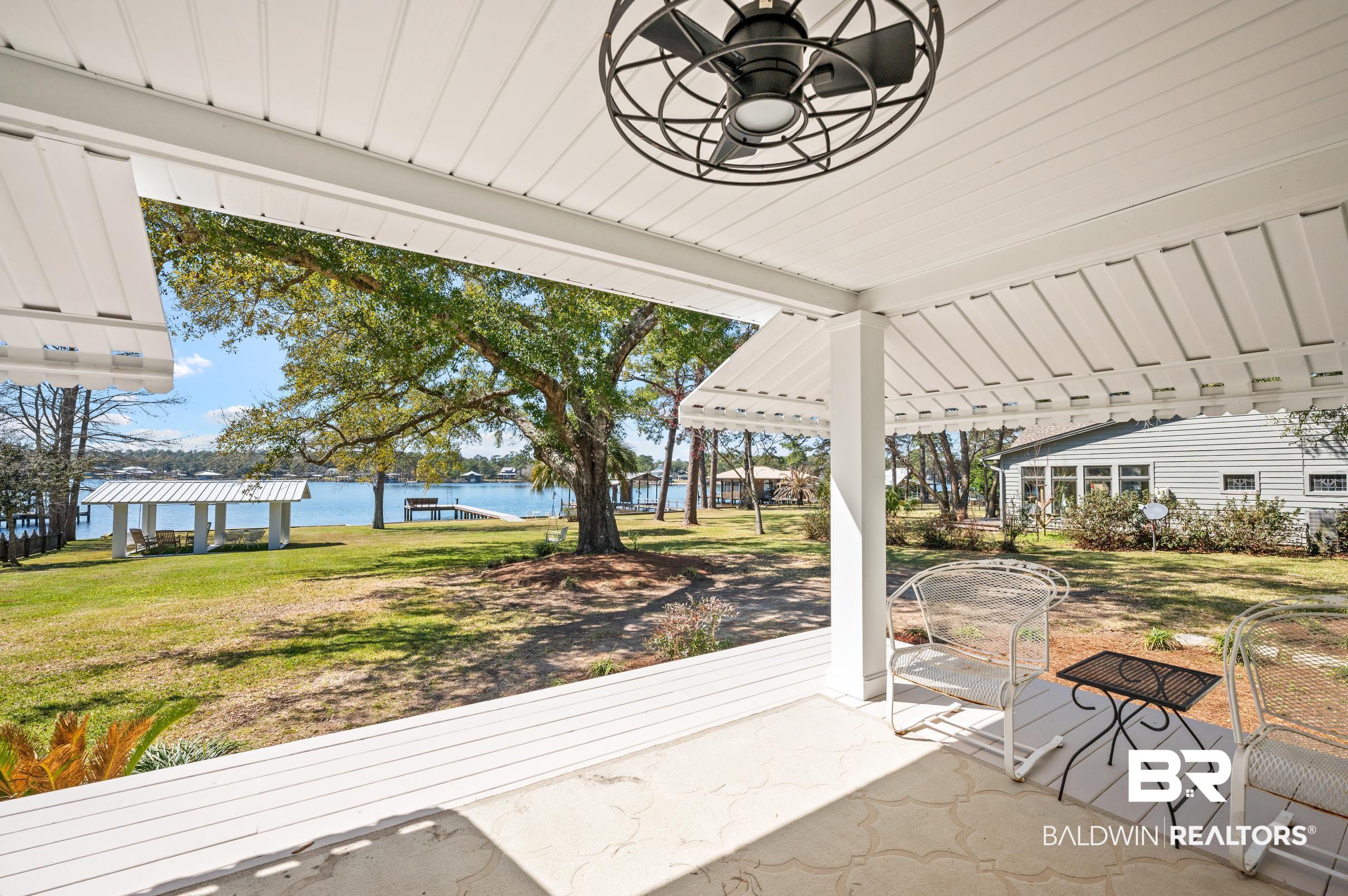 9459 Soldier Creek Road Lillian, AL 36549 - Photo 26 of 54 View of patio with a water view