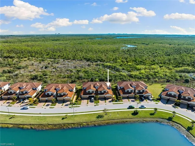 a view of a city with lawn chairs