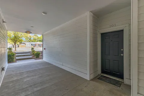 a view of an empty room and window