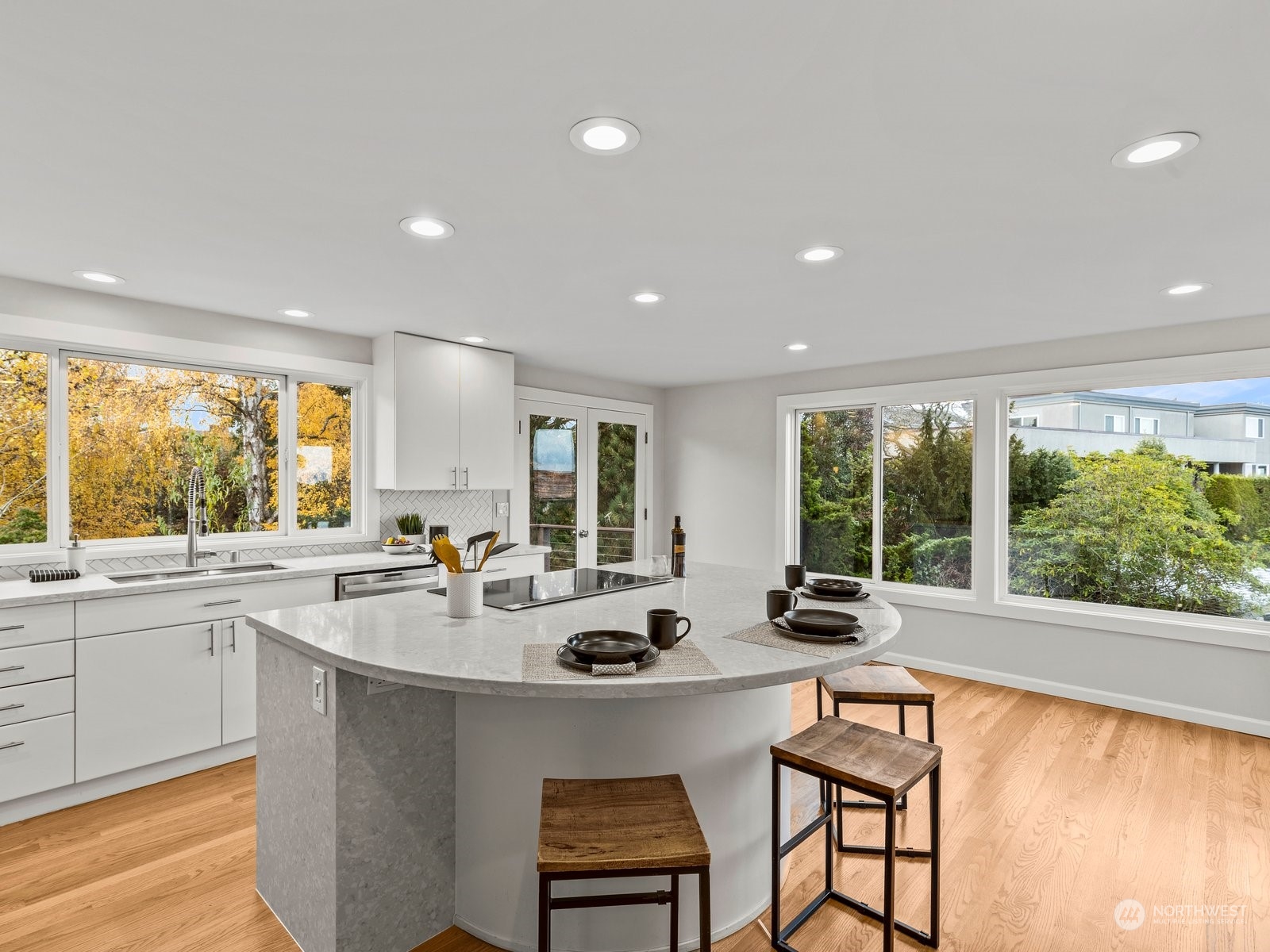 750 Northstream Lane Edmonds, WA 98020 - Photo 11 of 37 a kitchen with a sink and living room view